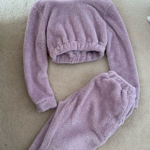 Two piece set. Light purple, fuzzy cropped long-sleeve with matching pants.